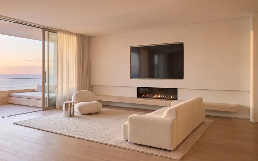 The bare ivory wall of an oceanfront living room, ready to scan